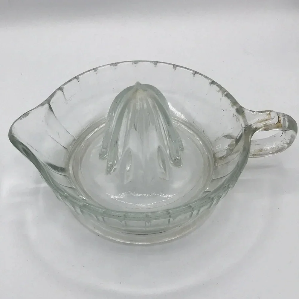Vintage clear glass citrus juicer with spout